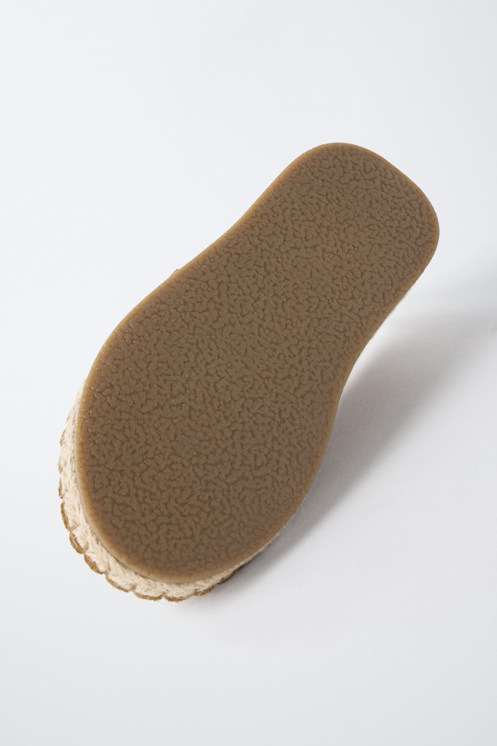 ESPADRILLE EN CUIR